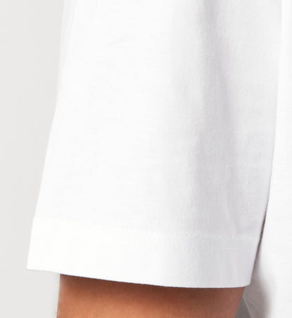 Weißes T-Shirt Unisex Relaxed Fit für Frauen und Männer bedruckt mit dem Design der Roger Rockawoo Kollektion Engelszahl 444